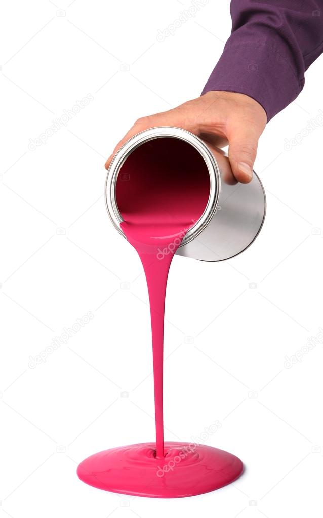 Hand pouring paint from tin can Stock Photo by ©anterovium 112589734